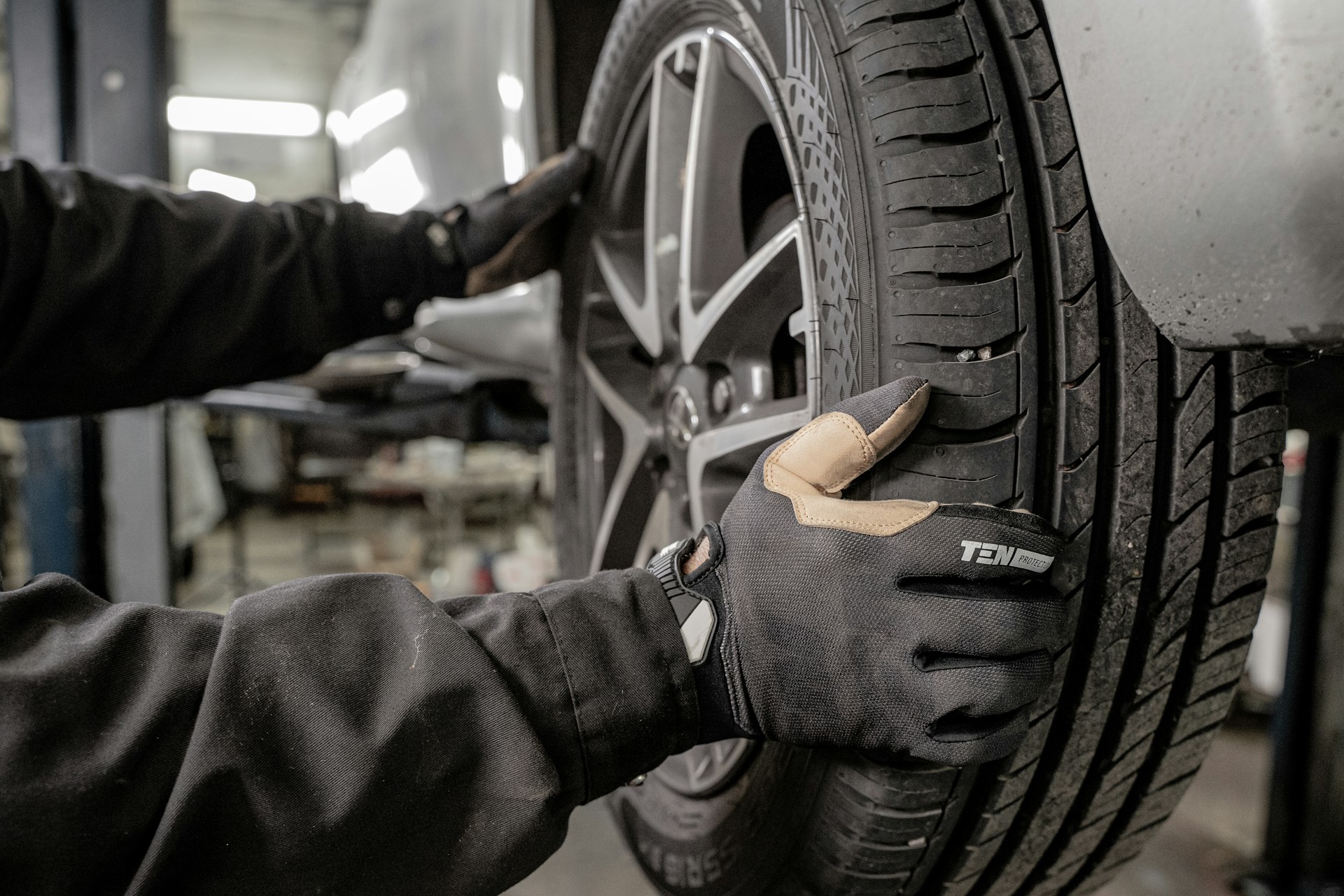 Mechanic working on a vehicle in the shop